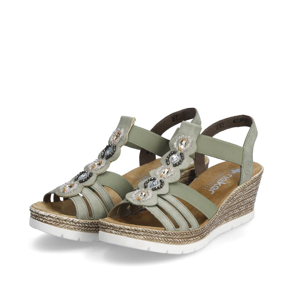 Rieker sandales compensées vertes femmes 619B2-52 avec insert élastique. Chaussures inclinée sur le côté.