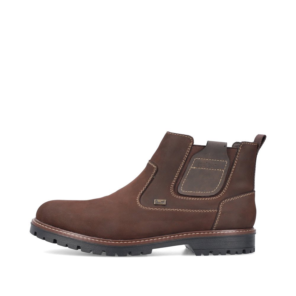 Forest brown Rieker men´s Chelsea boots F3660-25 with zipper as well as profile sole. The outside of the shoe