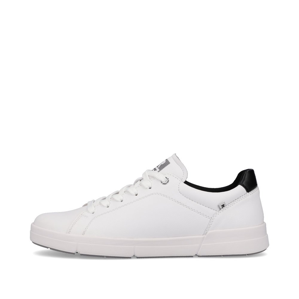 White Rieker men´s low-top sneakers 07102-80 with a super light and flexible sole. Outside of the shoe.