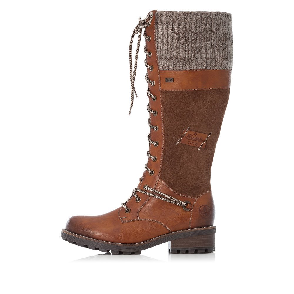 Caramel brown Rieker women´s high boots Z0442-24 with zipper as well as profile sole. The outside of the shoe