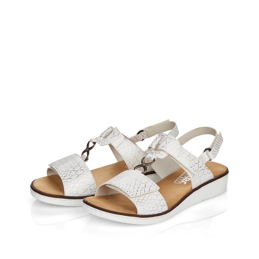 Ice white Rieker women´s wedge sandals 63687-80 with a hook and loop fastener. Shoes laterally.