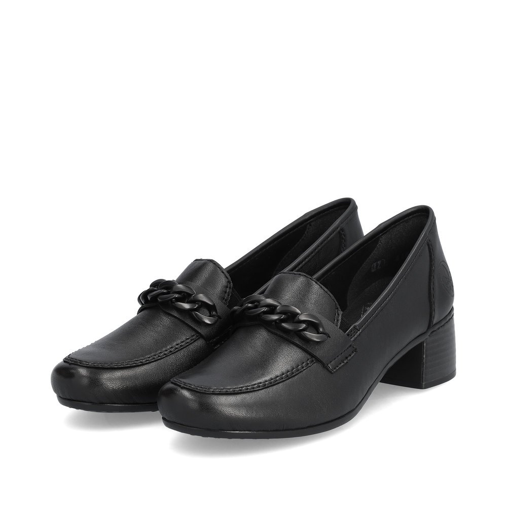 Black Rieker women´s loafers 41660-00 with elastic insert as well as stylish chain. Shoes laterally.