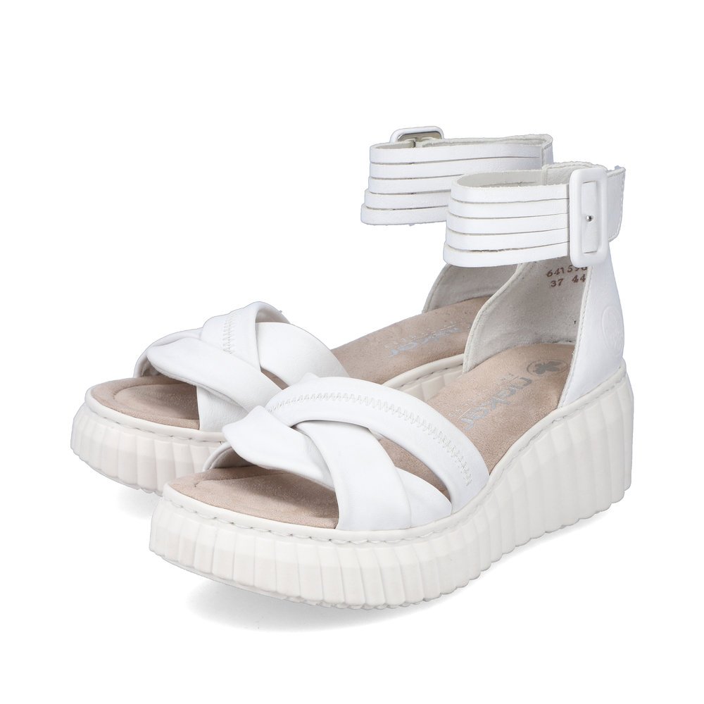 White Rieker women´s wedge sandals 64159-80 with a hook and loop fastener. Shoes laterally.