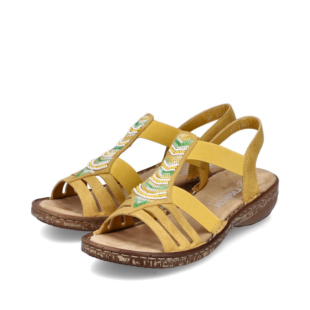 Sunny yellow Rieker women´s strap sandals 62808-68 with an elastic insert. Shoes laterally.