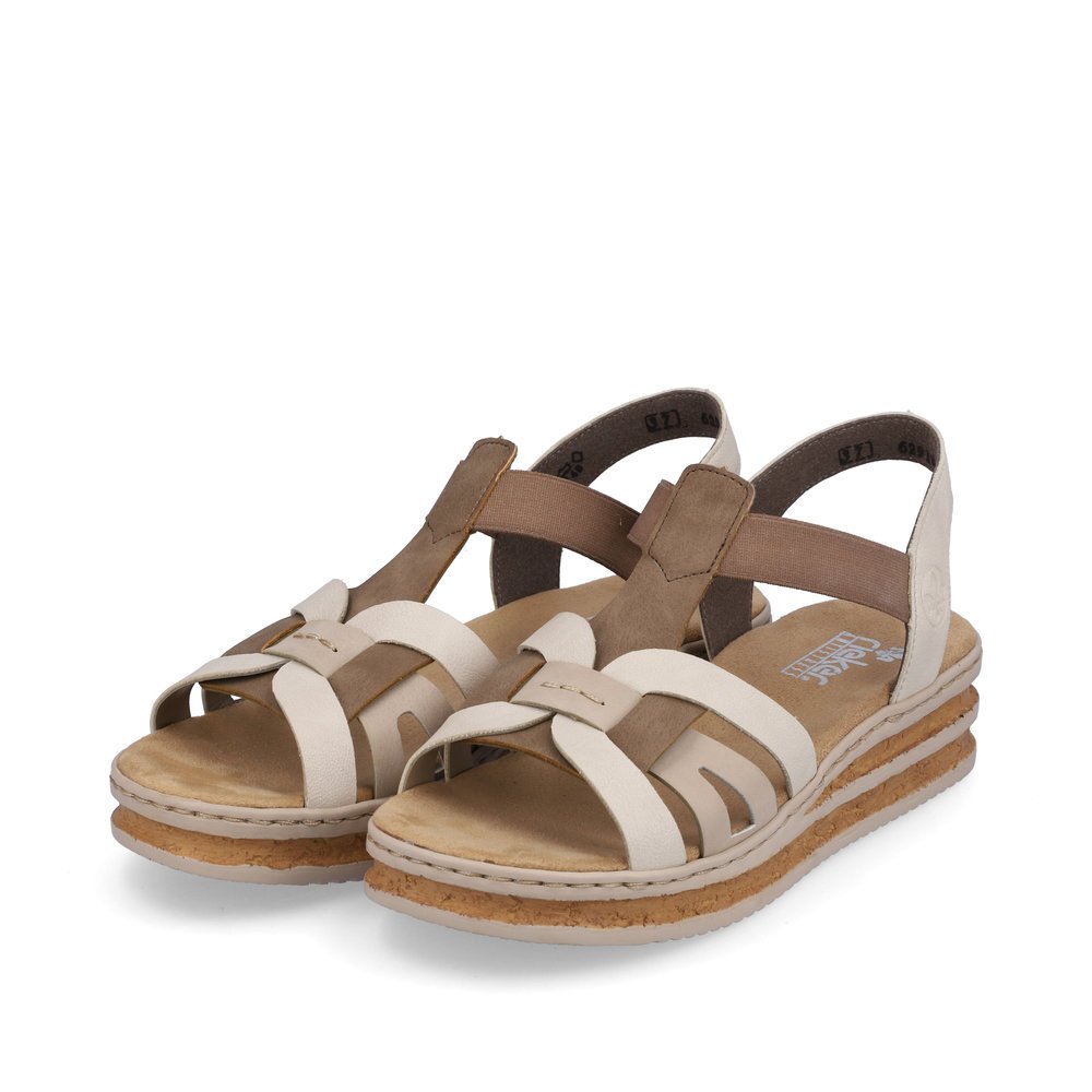 Beige Rieker women´s strap sandals 62918-62 with an elastic insert. Shoes laterally.