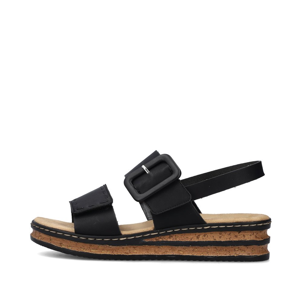 Black Rieker women´s wedge sandals 62950-00 with a hook and loop fastener. Outside of the shoe.