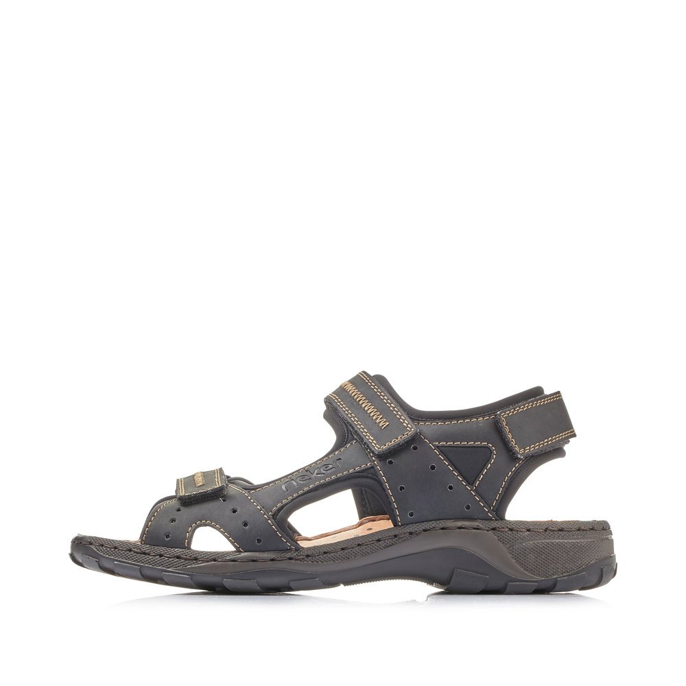 Black Rieker men´s hiking sandals 26061-00 with a hook and loop fastener. Outside of the shoe.