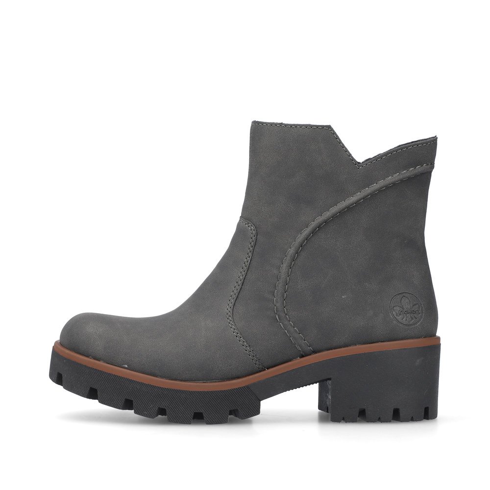 Brown-grey Rieker women´s ankle boots 79261-45 with profile sole with block heel. The outside of the shoe