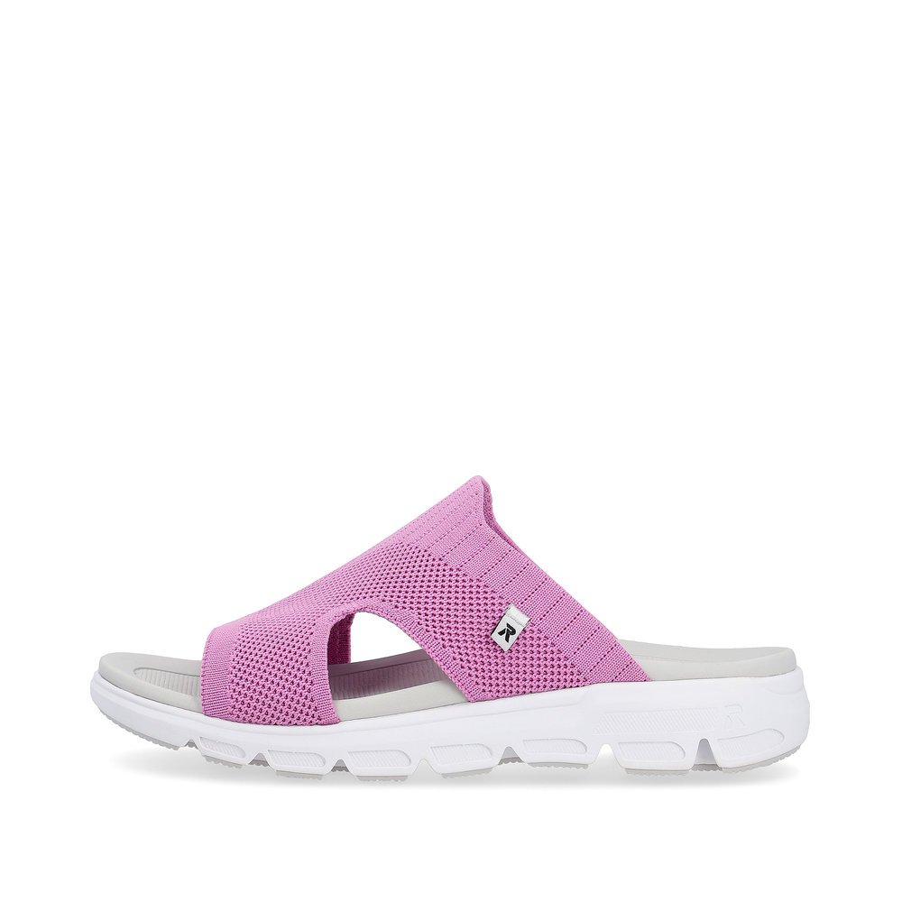 Pink washable Rieker women´s mules V8451-30 with a flexible and super light sole. Outside of the shoe.