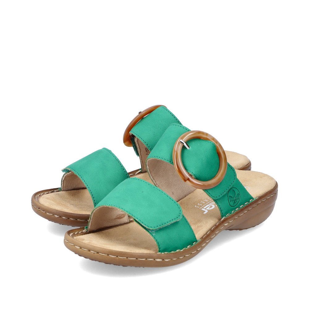 Grass green Rieker women´s mules 60894-52 with a hook and loop fastener. Shoes laterally.