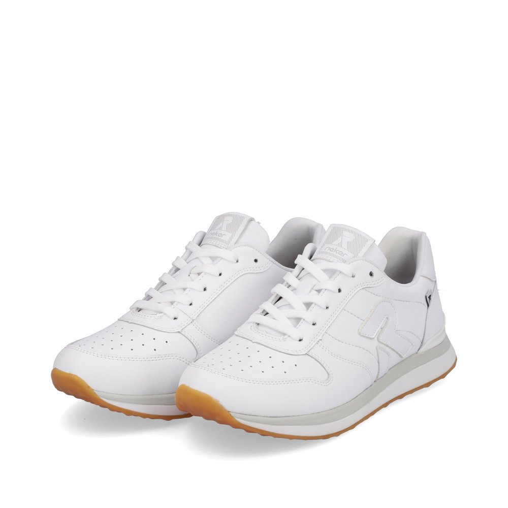 White Rieker women´s low-top sneakers 42501-80 with a flexible and super light sole. Shoes laterally.