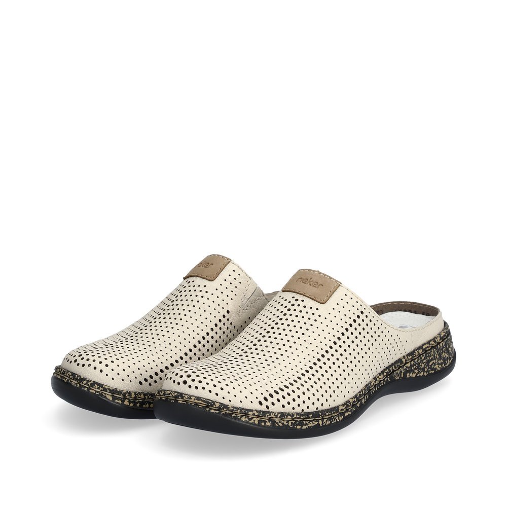 Sand beige Rieker women´s clogs 46334-60 in perforated look. Shoes laterally.