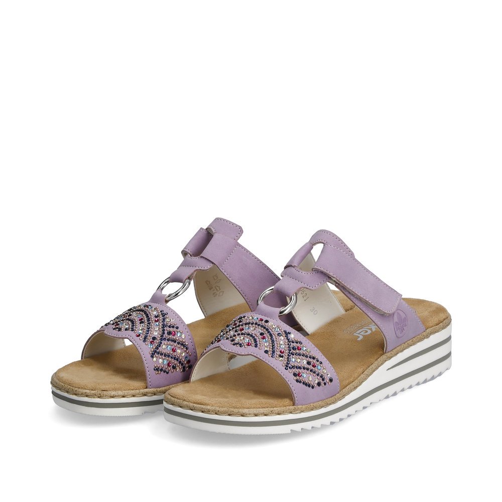 Lilac Rieker women´s mules V0621-30 with a hook and loop fastener. Shoes laterally.