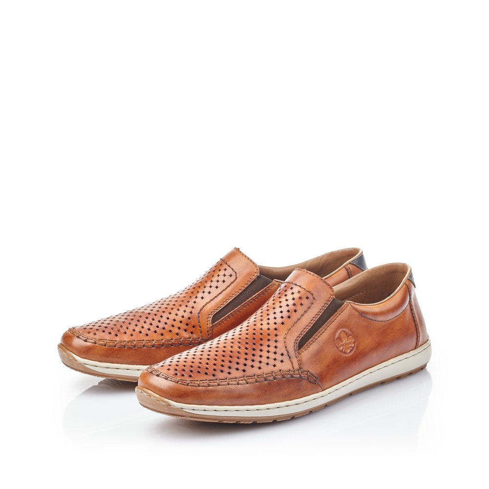 Hazel Rieker men´s slippers 08868-24 with elastic insert as well as perforated look. Shoes laterally.