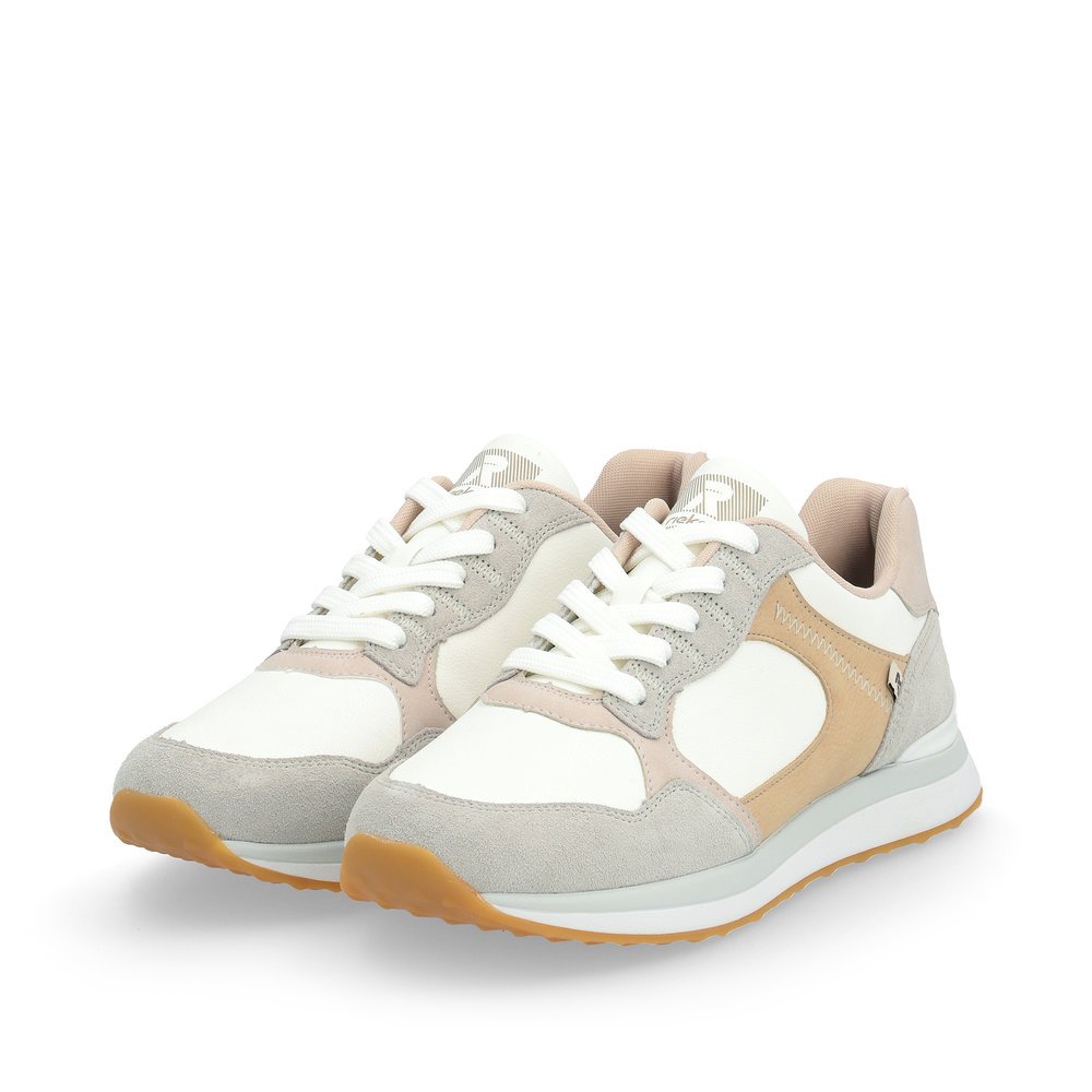 Beige Rieker women´s low-top sneakers 42508-81 with a flexible and super light sole. Shoes laterally.