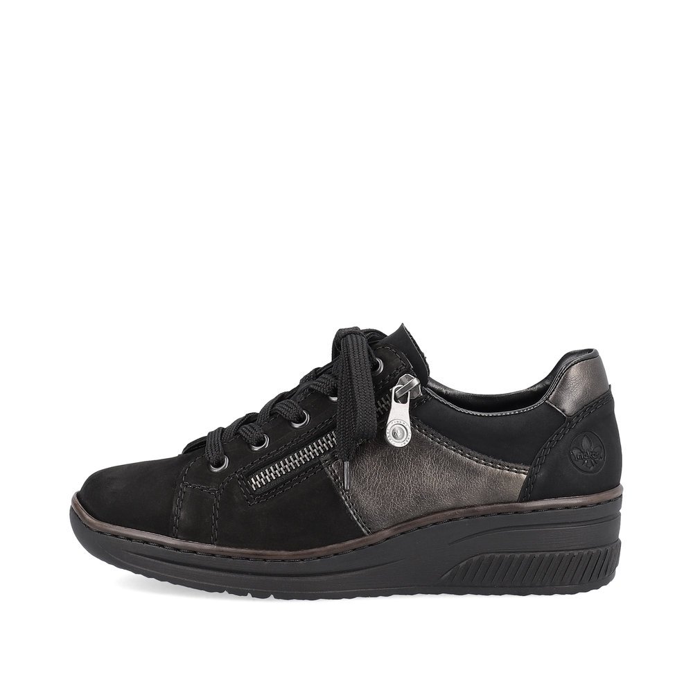 Night black Rieker women´s sneakers 48700-00 with light sole with wedge heel. The outside of the shoe