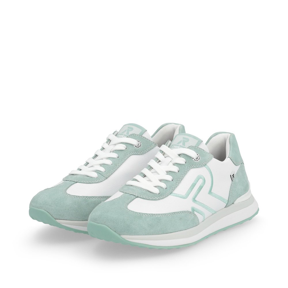 White Rieker women´s low-top sneakers 42509-81 with a flexible sole. Shoes laterally.