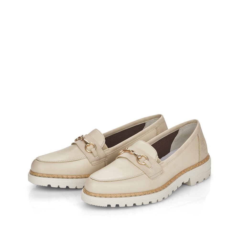 Light beige Rieker women´s loafers 54862-80 with an elastic insert. Shoes laterally.