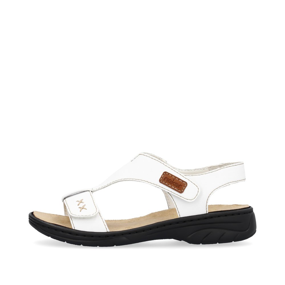 White Rieker women´s strap sandals 64577-80 with a hook and loop fastener. Outside of the shoe.