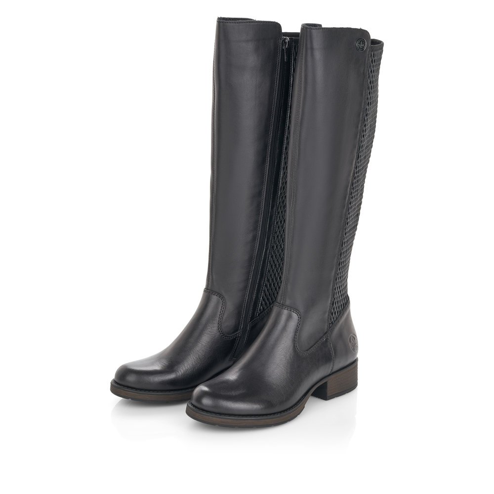 Jet black Rieker women´s high boots Z9591-00 with a zipper as well as profile sole. Shoe laterally