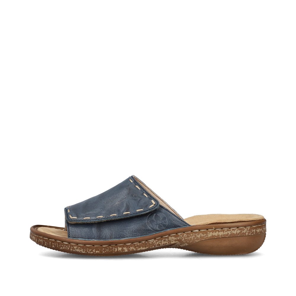 Slate blue Rieker women´s mules 62890-14 with a hook and loop fastener. Outside of the shoe.