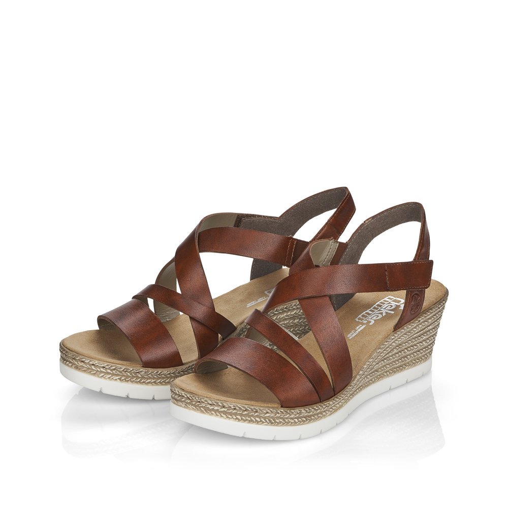 Espresso brown Rieker women´s wedge sandals 61937-24 with a hook and loop fastener. Shoes laterally.