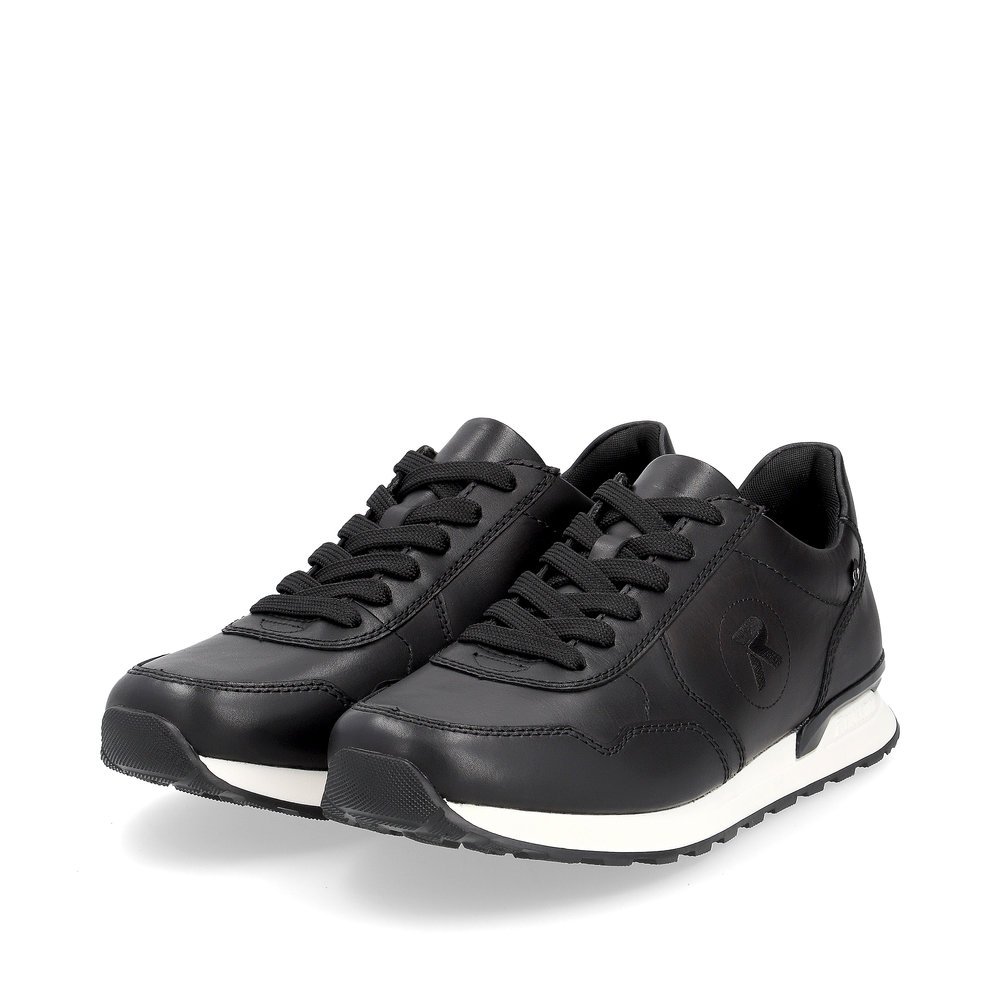 Black Rieker men´s low-top sneakers U0304-01 with a light and grippy sole. Shoes laterally.