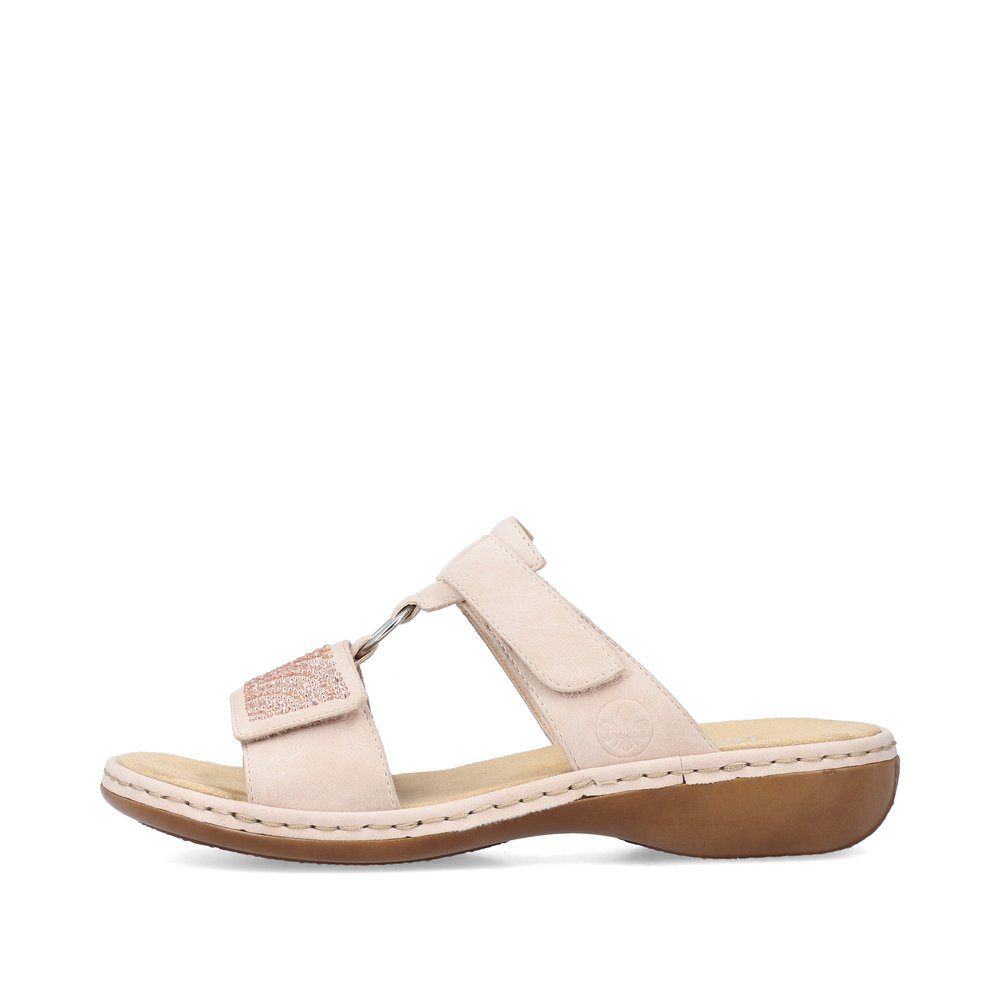 Pink Rieker women´s mules 65980-31 with a hook and loop fastener. Outside of the shoe.