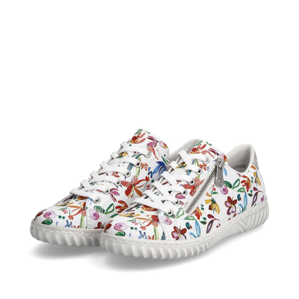 Bunte Rieker Damen Sneaker Low N0900-91 mit Reißverschluss sowie floralem Muster. Schuhpaar seitlich schräg.