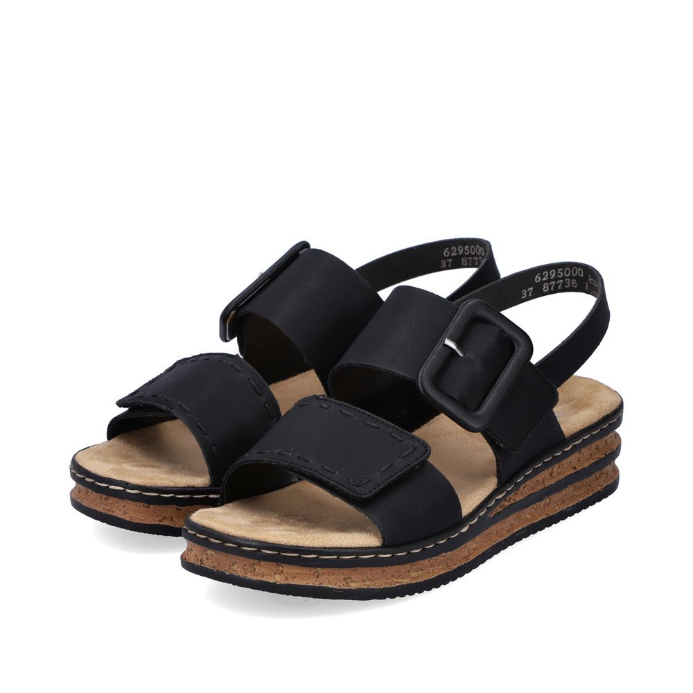 Black Rieker women´s wedge sandals 62950-00 with a hook and loop fastener. Shoes laterally.