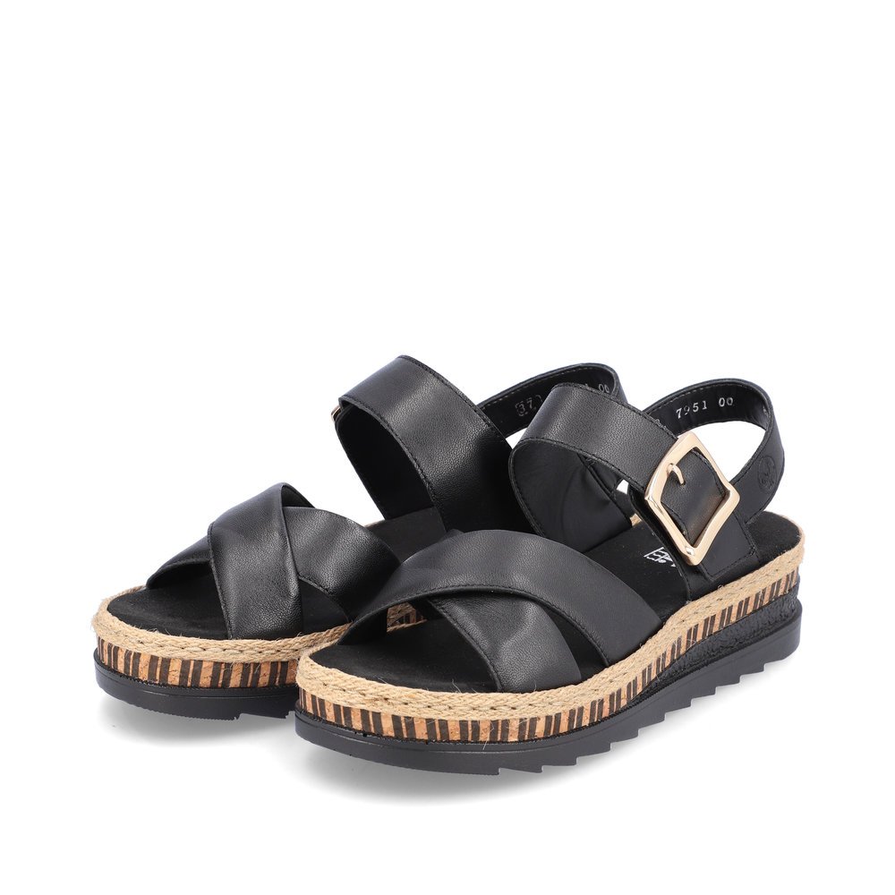 Black Rieker women´s wedge sandals V7951-00 with a hook and loop fastener. Shoes laterally.