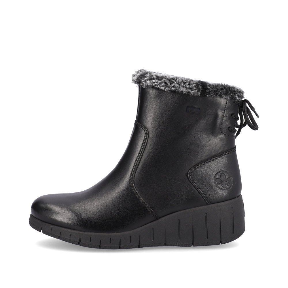 Jet black Rieker women´s ankle boots Y1350-00 with profile sole with wedge heel. The outside of the shoe