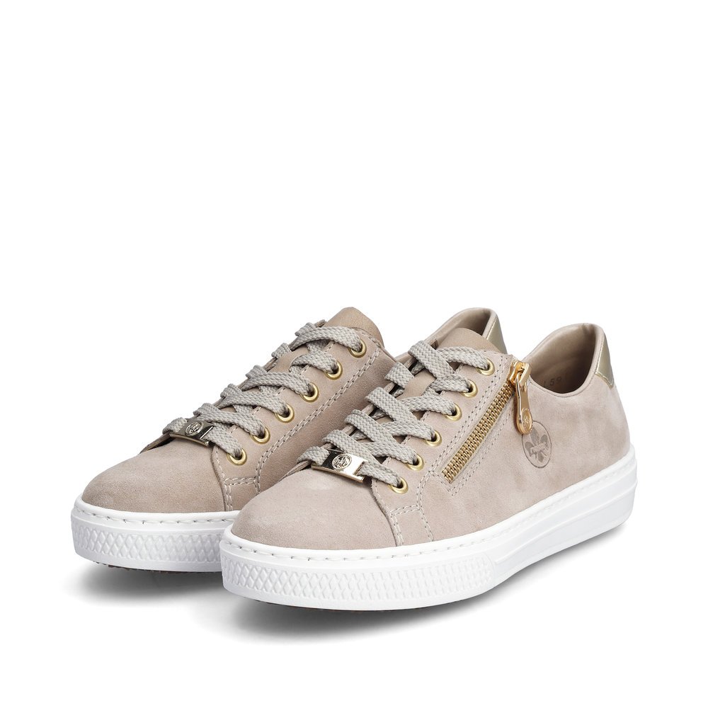 Brown Rieker women´s low-top sneakers L59L1-60 with a zipper. Shoes laterally.