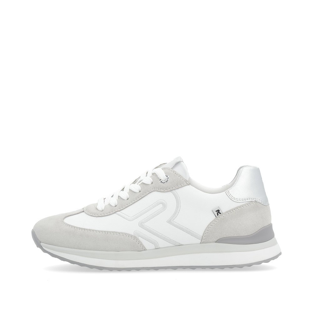 White Rieker women´s low-top sneakers 42509-80 with a flexible and super light sole. Outside of the shoe.