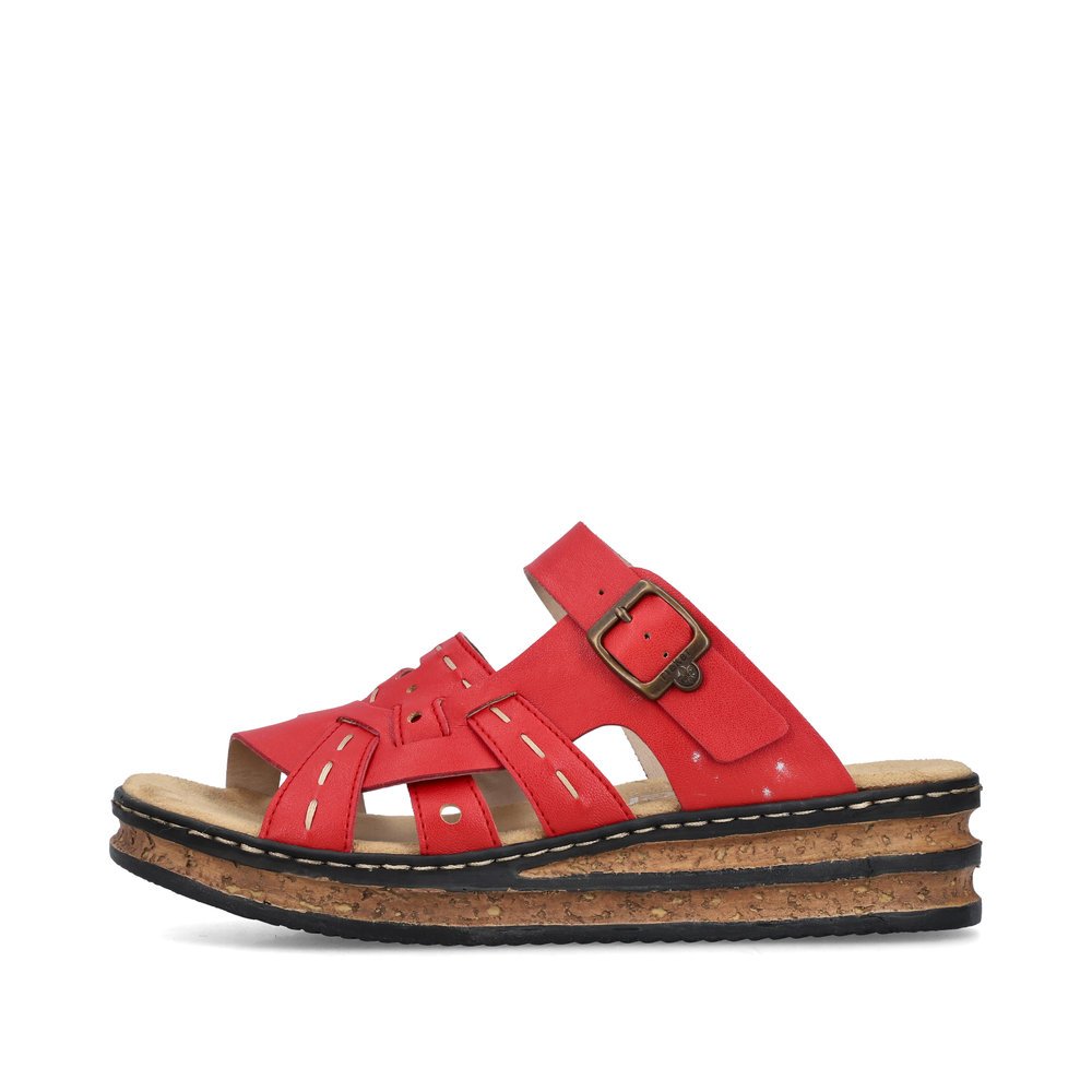 Red Rieker women´s mules 62976-33 with a buckle as well as decorative stitching. Outside of the shoe.