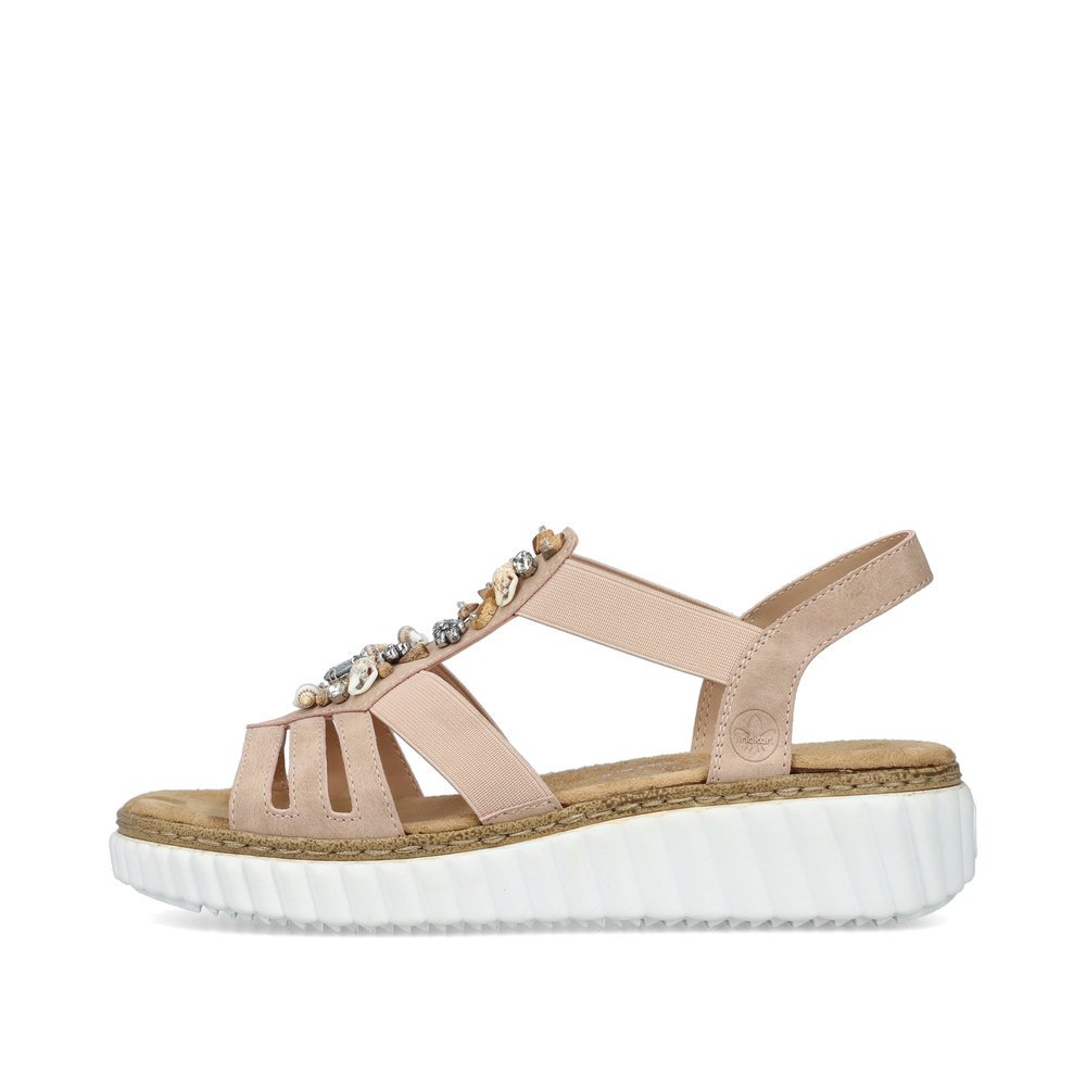 Dusky pink Rieker women´s wedge sandals 63249-32 with an elastic insert. Outside of the shoe.