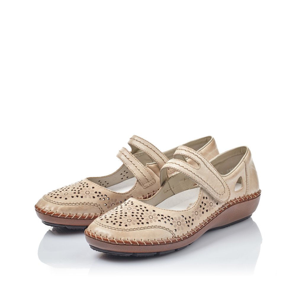 Champagne-colored Rieker women´s ballerinas 44875-60 with a hook and loop fastener. Shoes laterally.