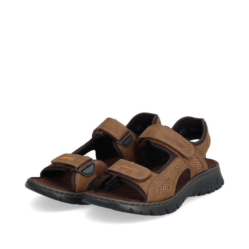 Cinnamon brown Rieker men´s hiking sandals 26761-27 with a hook and loop fastener. Shoes laterally.