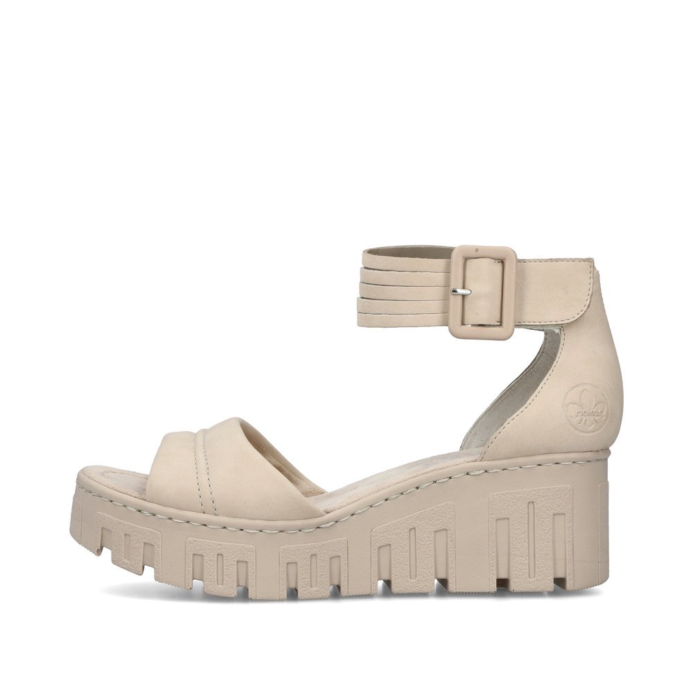 Sand beige Rieker women´s wedge sandals 68093-60 with a hook and loop fastener. Outside of the shoe.