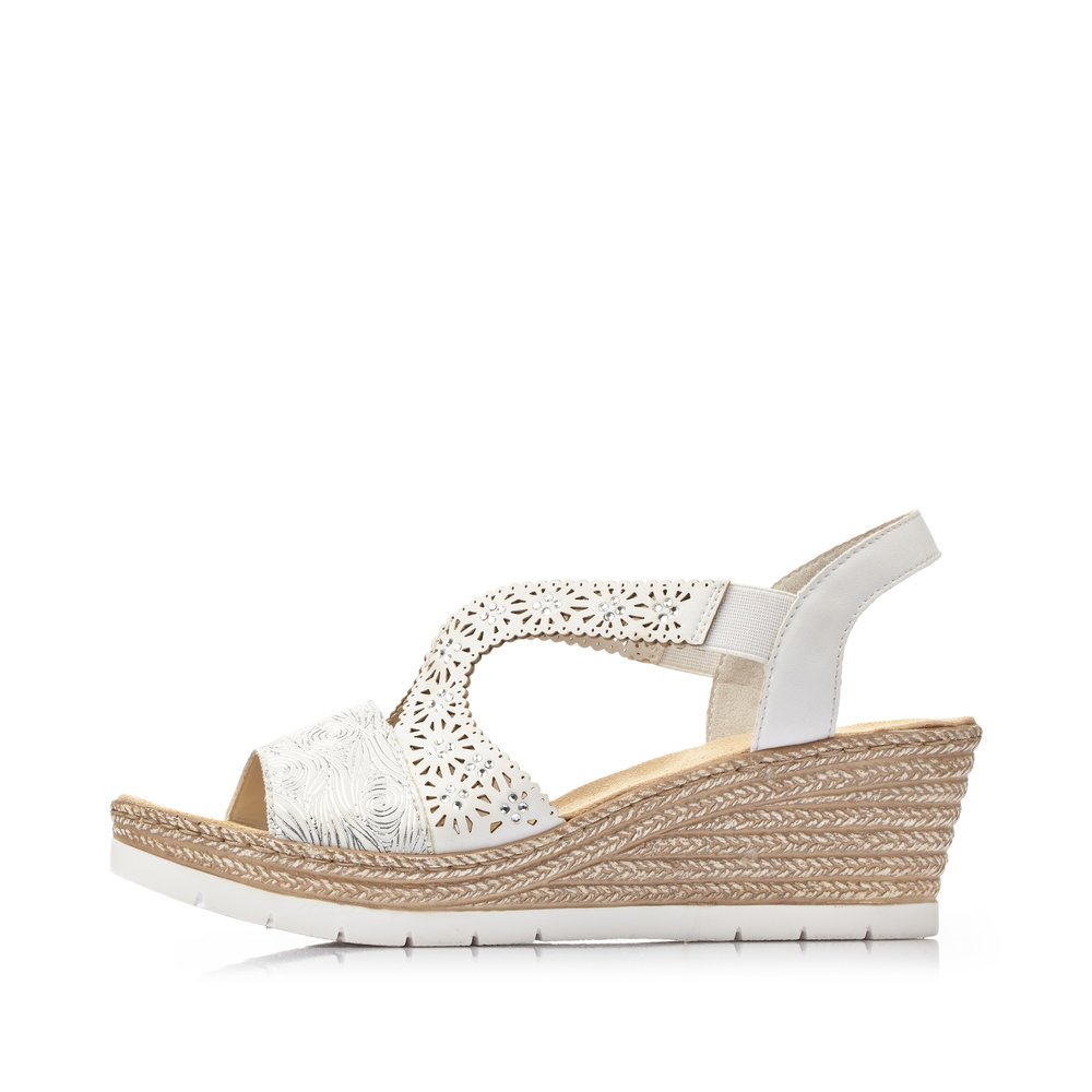 White Rieker women´s wedge sandals 61916-80 with an elastic insert. Outside of the shoe.
