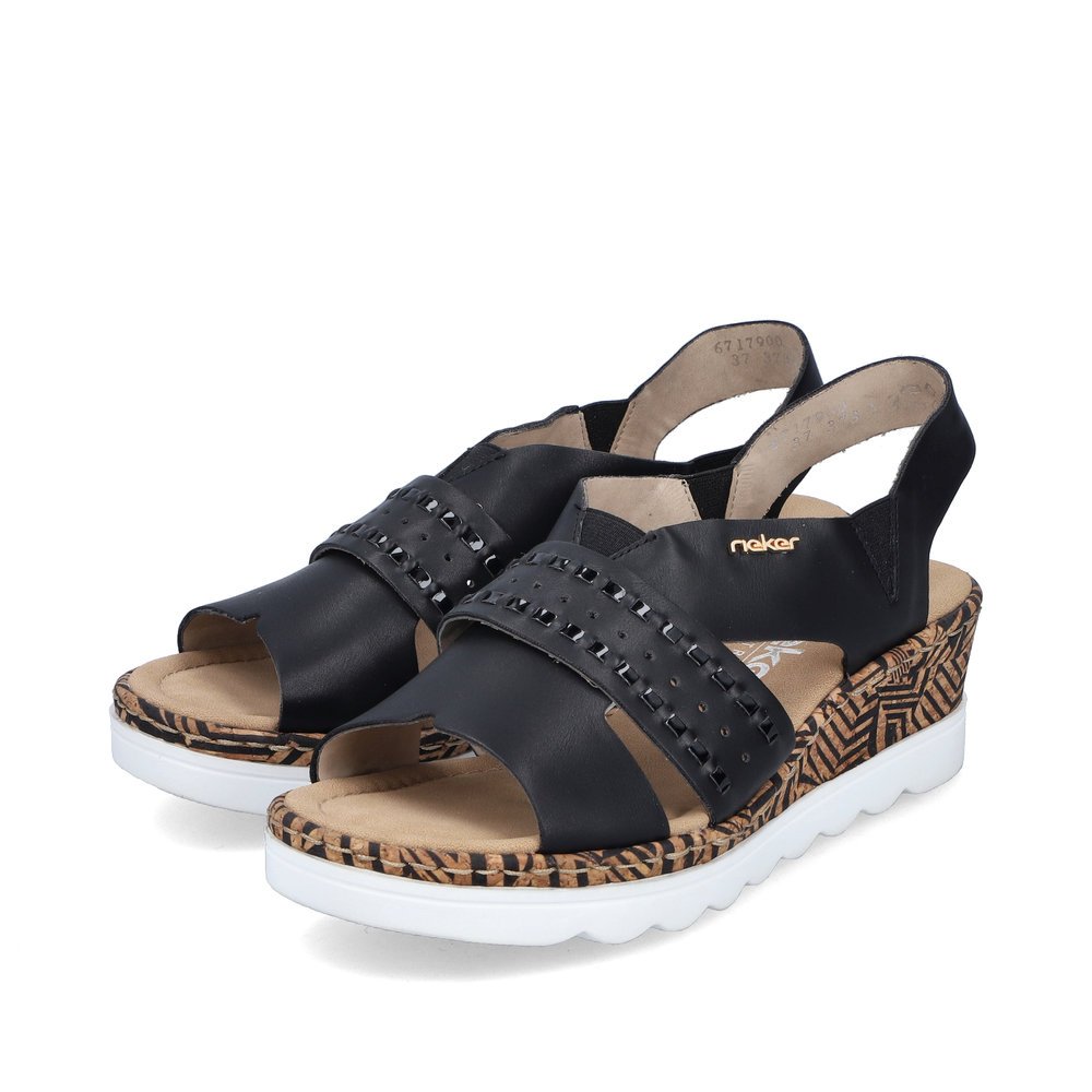 Night black Rieker women´s wedge sandals 67179-00 with an elastic insert. Shoes laterally.