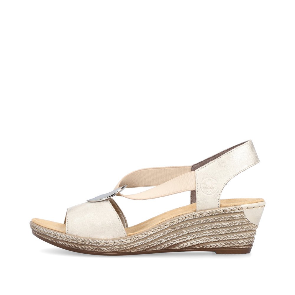 Rieker sandales compensées beiges femmes 624H6-60 avec insert élastique. Côté extérieur de la chaussure.