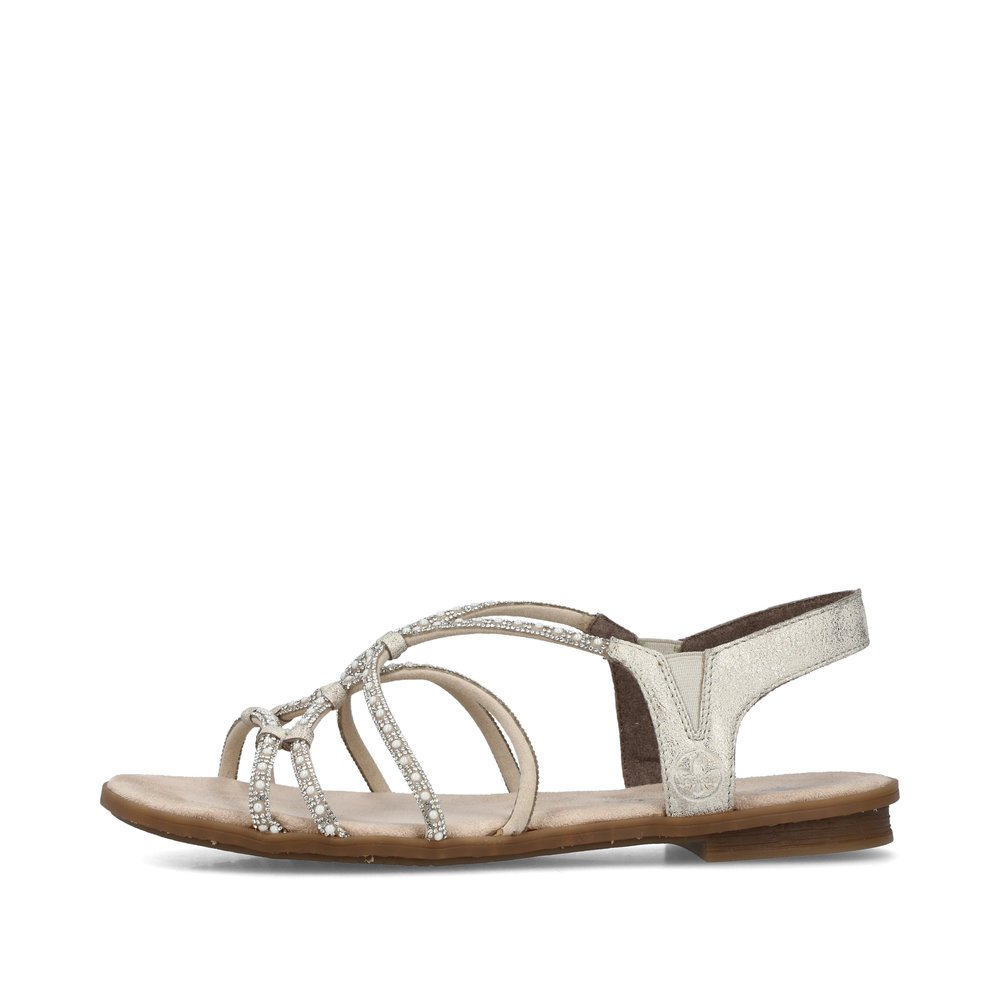 Beige Rieker women´s strap sandals 64270-60 with an elastic insert. Outside of the shoe.
