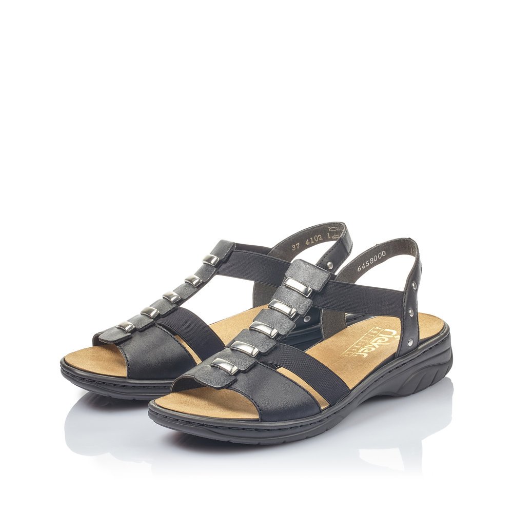 Night black Rieker women´s strap sandals 64580-00 with an elastic insert. Shoes laterally.