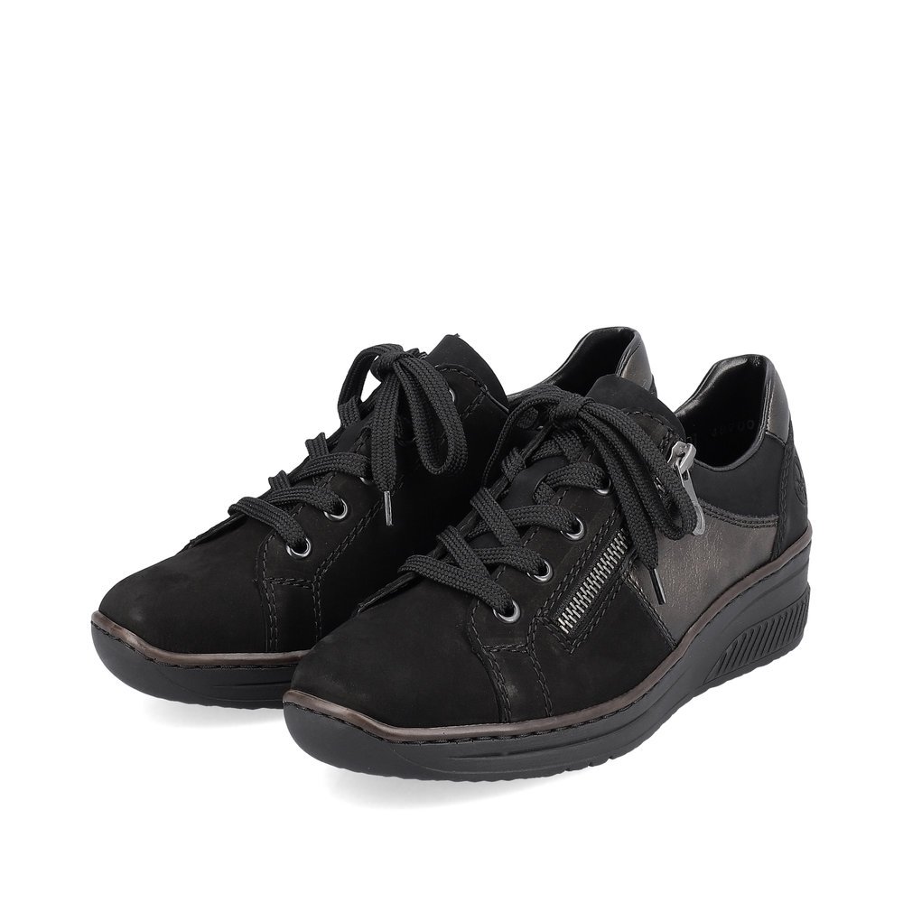 Night black Rieker women´s sneakers 48700-00 with light sole with wedge heel. Shoe laterally