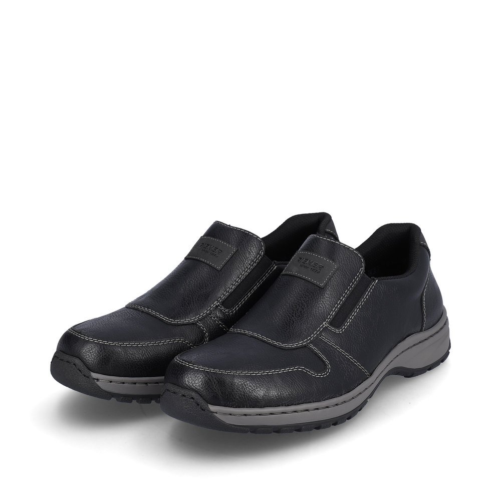 Graphite black Rieker men´s slippers 03355-00 with shock-absorbing and light sole. Shoe laterally