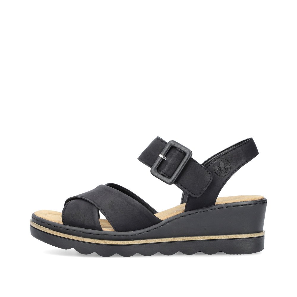 Jet black Rieker women´s wedge sandals 67463-00 with a hook and loop fastener. Outside of the shoe.