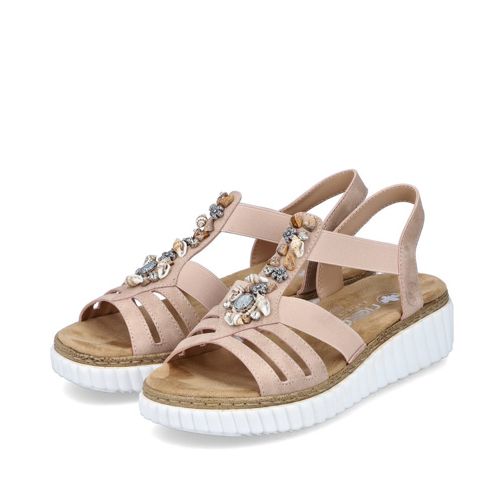 Dusky pink Rieker women´s wedge sandals 63249-32 with an elastic insert. Shoes laterally.