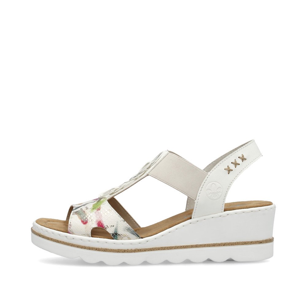 Off-white Rieker women´s wedge sandals 67498-90 with an elastic insert. Outside of the shoe.