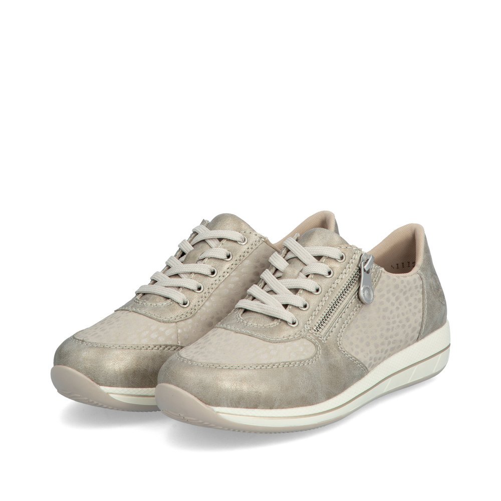 Beige Rieker women´s low-top sneakers N1112-60 with zipper as well as extra width H. Shoes laterally.